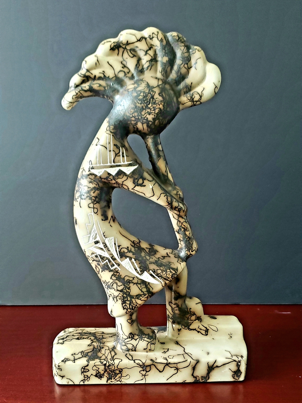 Native American Navajo Horse hair Pottery Statue depicting Kokopelli, Signed